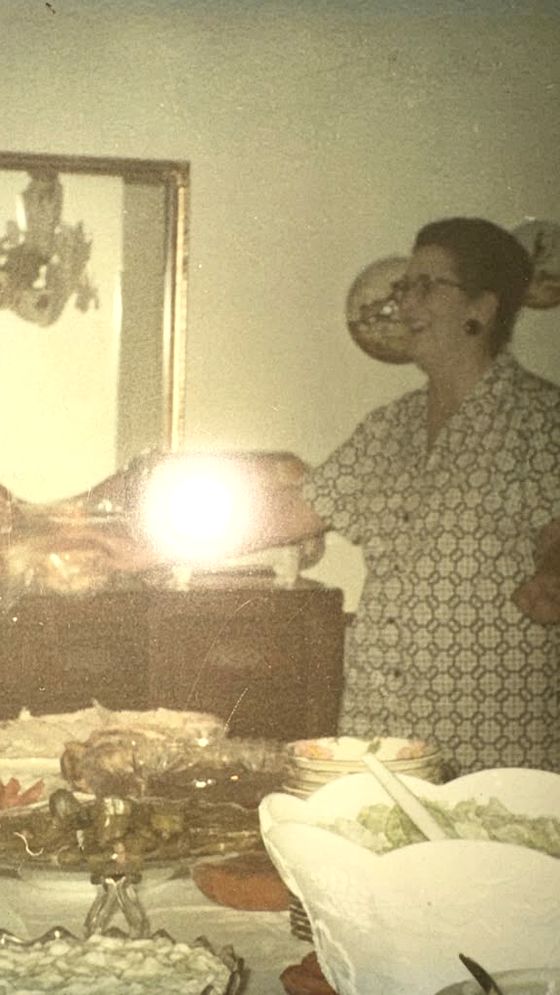 Willie Bessie Clara Franks in her home at a holiday table